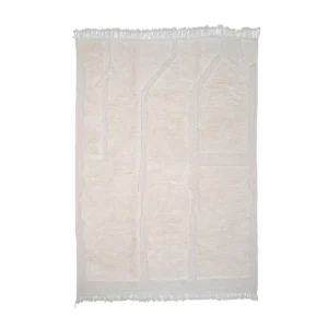 A rectangular, cream-colored rug with a textured geometric pattern and fringed edges, this hand-knotted piece is an artisanal gem.