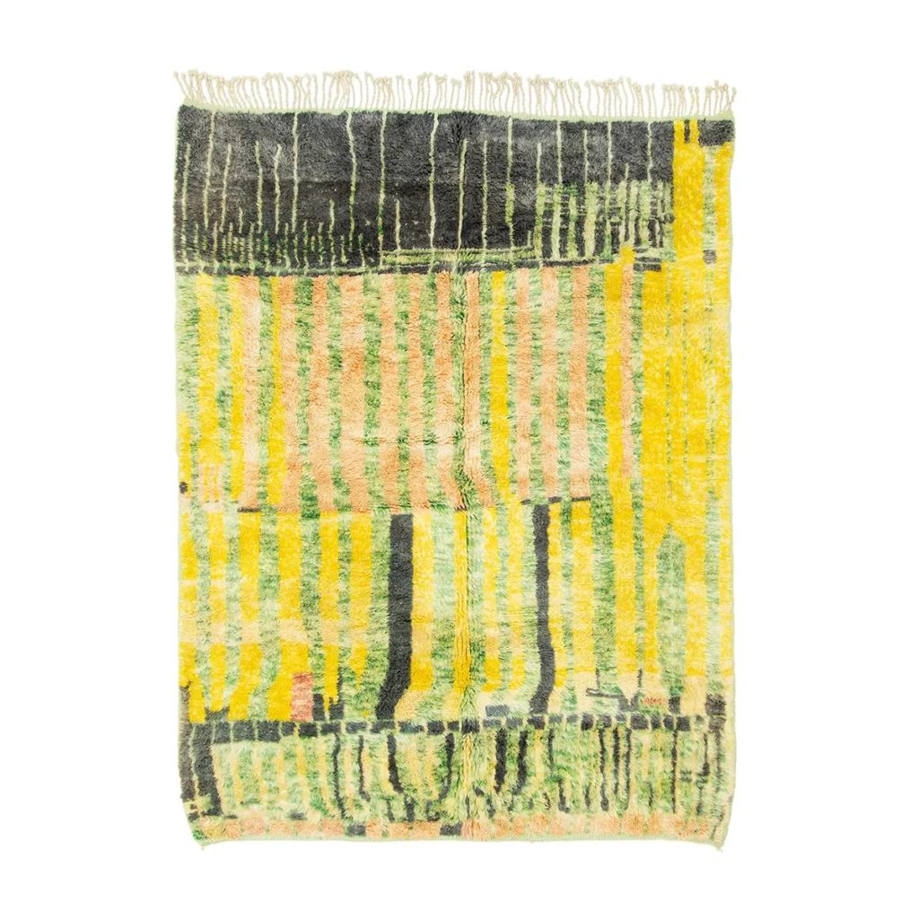 This hand-knotted, rectangular artisanal rug showcases an abstract pattern with vertical lines and rectangles in shades of yellow, green, pink, and black. Fringes add a touch of elegance to the shorter side.