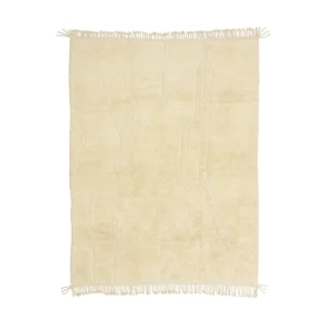This artisanal rug features a subtle abstract pattern in beige, complemented by fringed edges on all sides. Hand-knotted with precision, it embodies timeless craftsmanship, making it an elegant addition to any space.