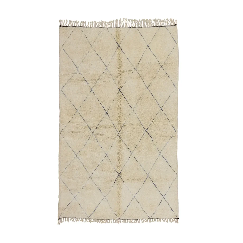 This luxury rug features a classic beige hue with a diamond pattern and elegantly fringed edges, offering a sophisticated touch to any room. Hand-knotted for superior quality, it is perfect for elevating your home decor.