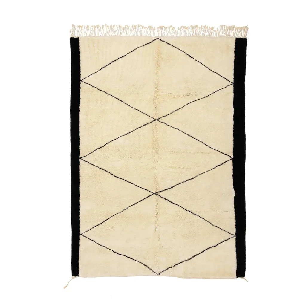 Discover the elegance of a luxury rug featuring a beige backdrop adorned with a black diamond pattern and bordered in black. This hand-knotted masterpiece is finished with an exquisite fringe, adding sophistication to any space.