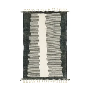 Rectangular rug with a central vertical stripe design in black and white. Features small black and white tassels on both ends.