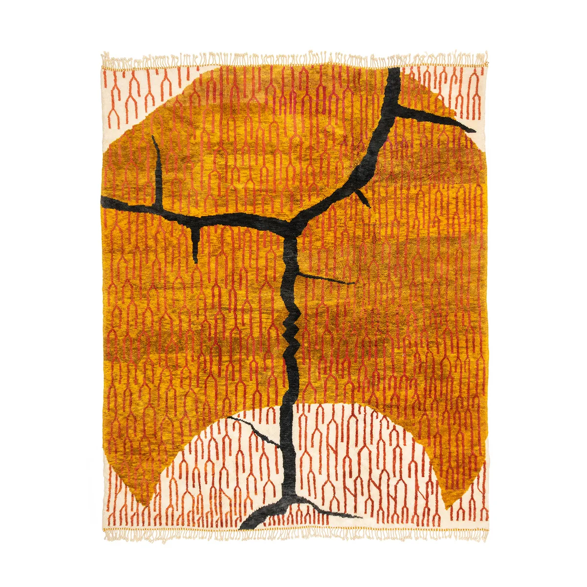 A colorful woven tapestry with abstract design. Features a large, cracked, dark line across a textured orange and yellow background with fringed edges.