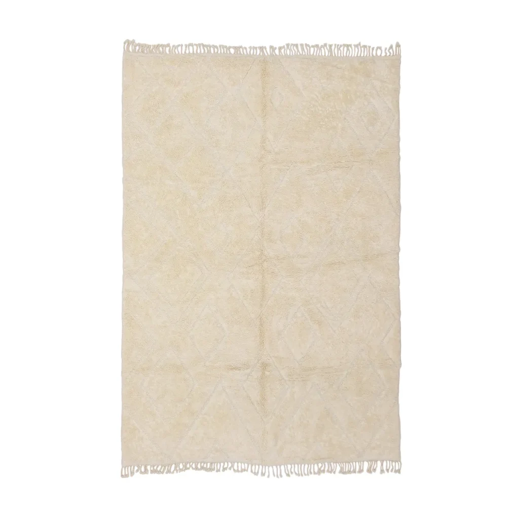 Rectangular off-white rug with a subtle diamond pattern, finished with short fringe on the shorter edges, displayed on a white background.