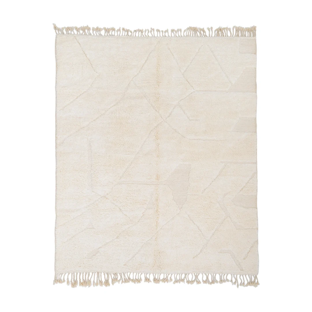 A rectangular cream-colored rug with subtle geometric patterns and fringes on the shorter ends, displayed on a white background.