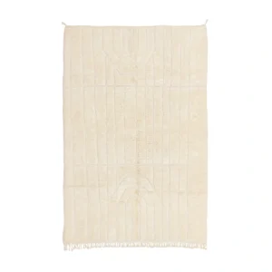 A rectangular, off-white textured rug with subtle geometric patterns and fringe on the bottom edge, displayed on a white background.
