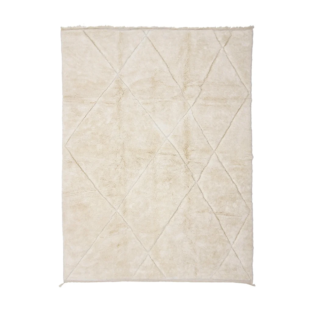 Rectangular off-white rug with a subtle diamond pattern and a soft, plush texture.