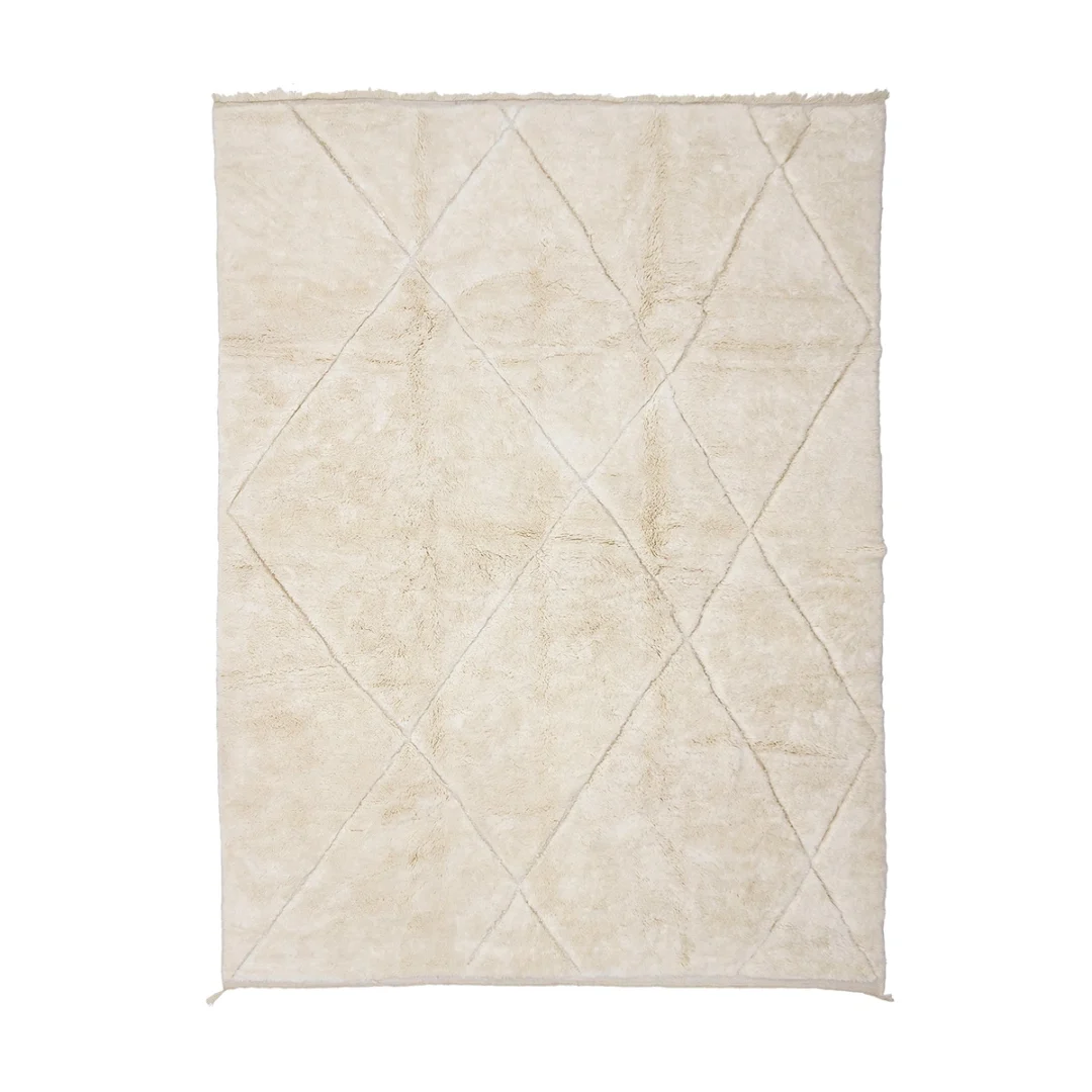 Rectangular off-white rug with a subtle diamond pattern and a soft, plush texture.