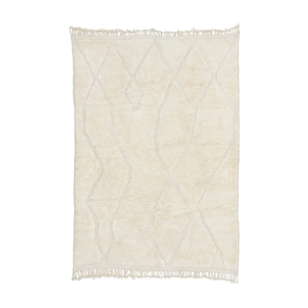 A rectangular, off-white hand-knotted rug with a subtle geometric pattern and fringed edges on the shorter sides.