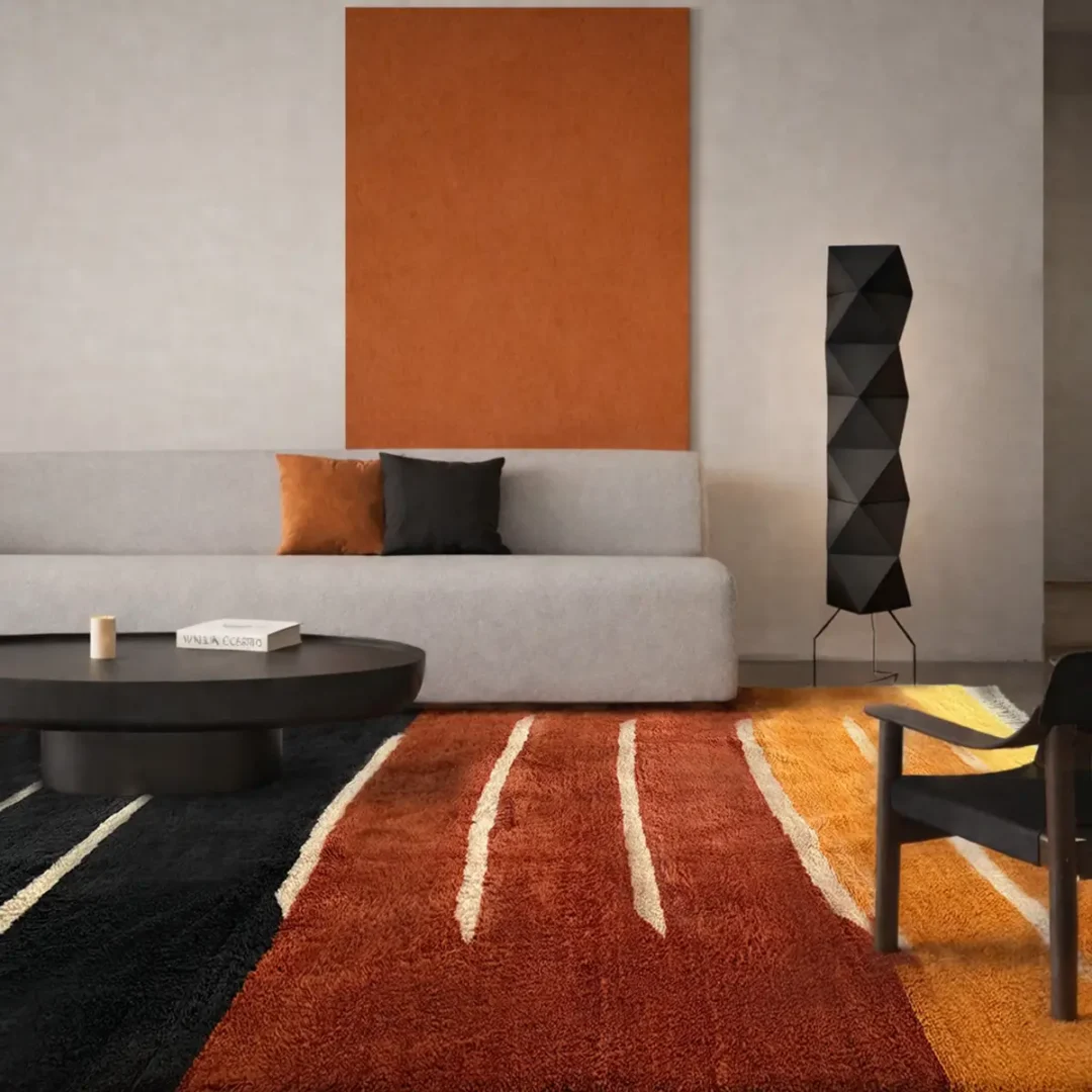 Azele Studio large colorful abstract rug styled in modern interior showing rust brown and saffron yellow color blocks